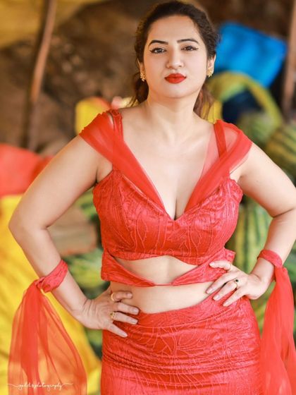 A creative and vibrant summer-themed shoot with an actress in a red outfit surrounded by watermelons. This series is playful and colorful, perfect for a brand campaign or a unique portfolio piece.