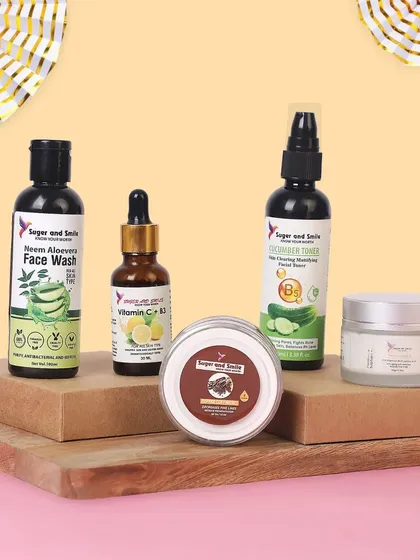 A creative group shot of a skincare line, styled with wooden blocks and props to create a natural, appealing look. This type of lifestyle product photography is perfect for website banners, advertisements, and building a strong brand identity.
