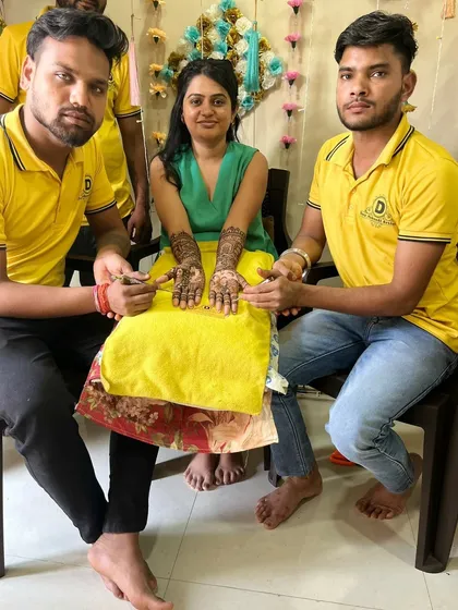 My team with a client, ensuring she is happy with her design.
