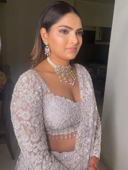 Lilac love. This Sangeet look features a soft purple and pink eyeshadow blend to match her stunning lilac lehenga.