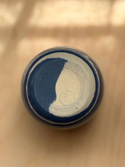 The bottom of a Blue Fish Tumbler, showing my maker's mark. It's a small sign that this piece was made with care, by hand.