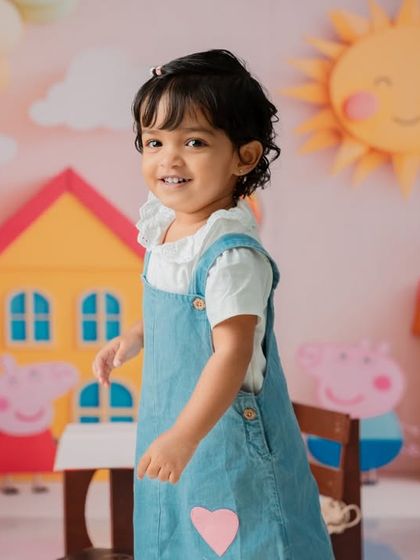 A happy, candid moment captured during the Peppa Pig session.