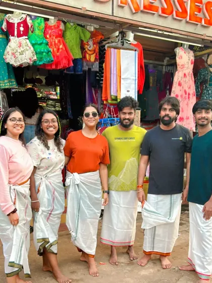 Trying out the local attire! Our travelers having fun wearing traditional dhotis in Gokarna.