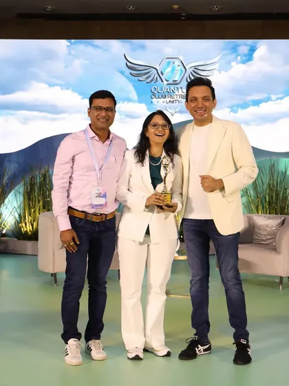 With my mentor Siddharth Rajsekar and family, receiving an award on stage. Mentorship is a cornerstone of our community.