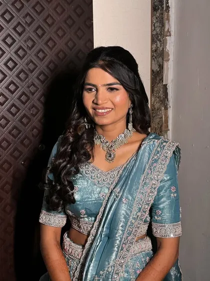 A beautiful smile from our engagement bride. The soft curls and fresh makeup are perfect for this joyous occasion.