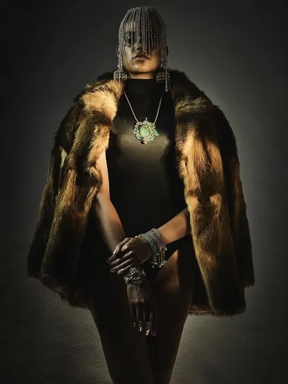 A full-length portrait for Reasons Jewellery, styling a statement emerald necklace and fur coat to create a look of imperial, timeless luxury.