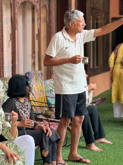 A candid moment of conversation and connection during our tea break. Satsang, or spiritual gathering, happens not just in formal sessions but in these informal interactions too.