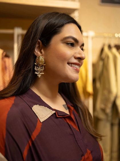 A candid shot of me wearing these gorgeous 'Nandi' danglers from a favorite homegrown jewellery designer. I believe in championing Indian designers, and statement earrings are a signature part of my look.