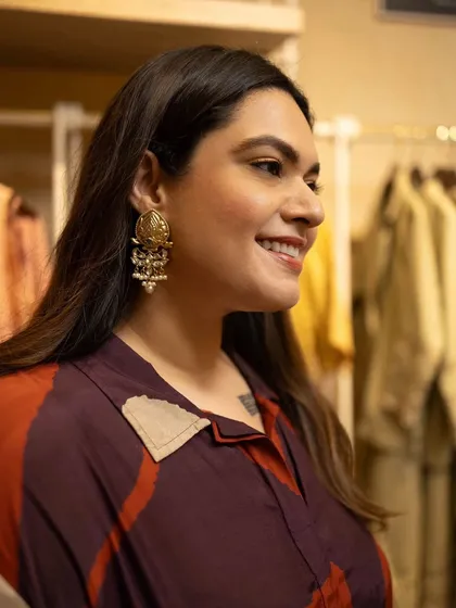 Another angle of the 'Nandi' earrings. When featuring accessories, I make sure to get multiple shots to show the craftsmanship and how the piece looks from different perspectives.