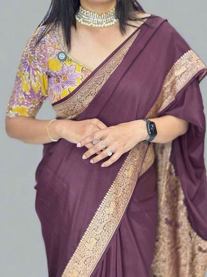 A closer look at the drape of our dark brown Banarasi saree. The fabric is soft yet has enough structure to hold pleats beautifully, and the antique gold border adds a touch of understated luxury.