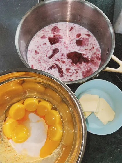 The key components for my raspberry pastry cream: fresh raspberry puree, egg yolks, and butter. No shortcuts, just real ingredients.