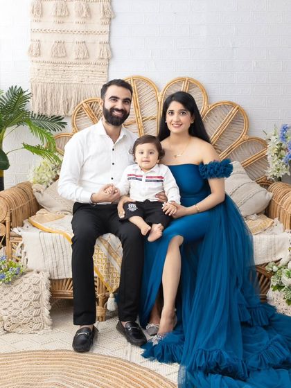 A beautiful family portrait celebrating a new chapter. The combination of a maternity shoot and a family session tells a wonderful story.