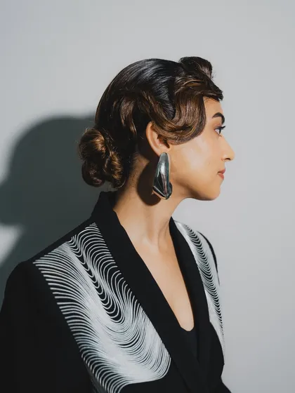 This vintage-inspired slick-back wave is one of my favorite editorial hairstyles. I created this sculpted, high-fashion look for Ridhi Khosla, proving that a classic style can feel incredibly modern and powerful.