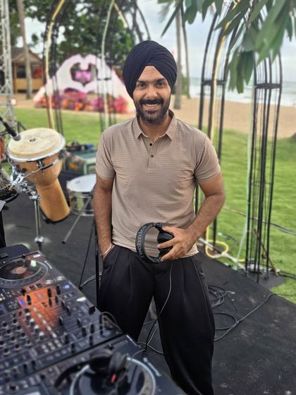 At the console for a beachside wedding event in Khao Lak. My setup is versatile and can be adapted for any environment, from ballrooms to beaches.