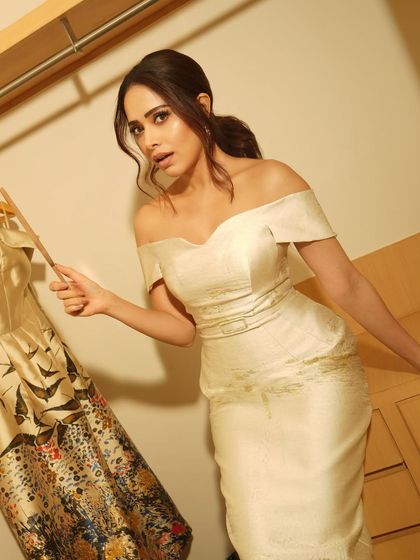 A playful, on-location shoot with Nushrratt Bharuccha in a hotel. This shot in the closet creates a fun, narrative-driven scene.