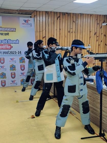 Young rifle shooters practice their standing positions in unison during a competitive event held at our range. Their focus and synchronized form highlight the discipline instilled during training.