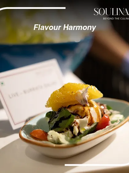 A close-up of our live Burrata salad, showcasing the harmony of fresh ingredients and beautiful presentation.