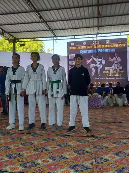 The lineup of champions in the Cadet Female category at the state championship.