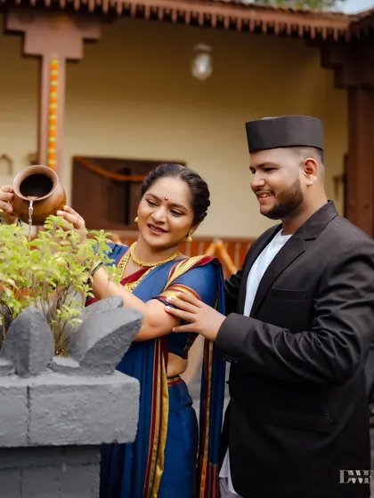 A moment of shared tradition, as the bride-to-be waters a Tulsi plant. This pre-wedding shot is rich in cultural symbolism and personal connection.