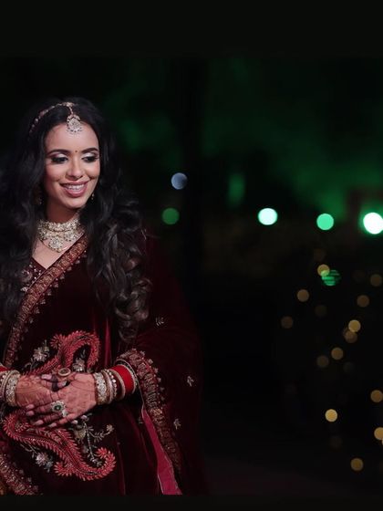 Palak's reception look was all about subtle elegance. Her multi-colored lehenga was paired with a soft makeup look and beautiful open waves.