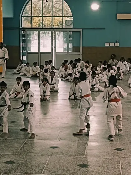Students practicing their moves during a belt grading test. The dojo is full of energy and discipline on these important days.