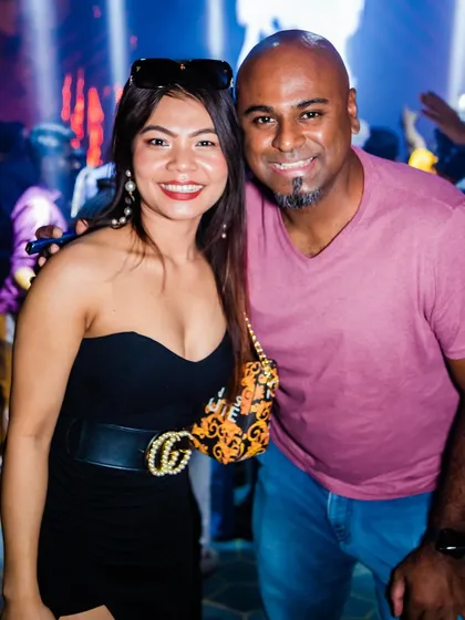Posing with a guest at the DJ booth.