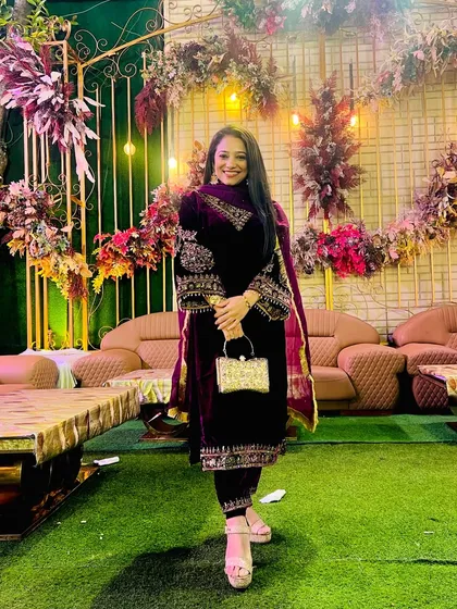 Posing at a wedding reception. Being part of these celebrations helps me understand the latest trends in wedding entertainment, ensuring my choreography is fresh, modern, and perfect for your big day.