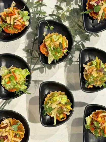 An overhead view of our assorted canapés. Each one is a unique combination of flavours and textures, showcasing the variety and creativity of our appetizer menu.