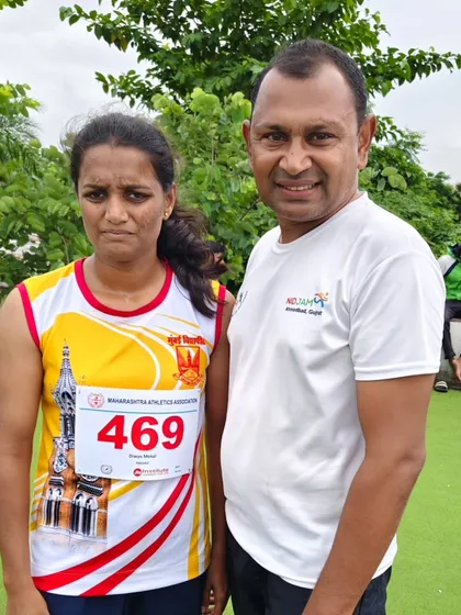 Posing with our athlete Divya Mokal before her race. Consistent training and dedication are the keys to achieving success in both sports and police recruitment.