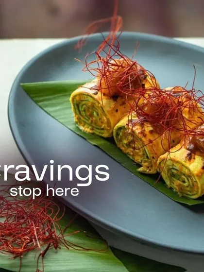 Where cravings stop, and indulgence begins. These savory rolls, garnished with fine chili threads, are plated on a banana leaf for an authentic and artistic touch.