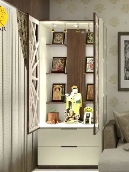 A sleek, modern pooja cabinet with drawers for storage. The unit has internal lighting to highlight the idols and can be closed to maintain a minimalist look in the living room.