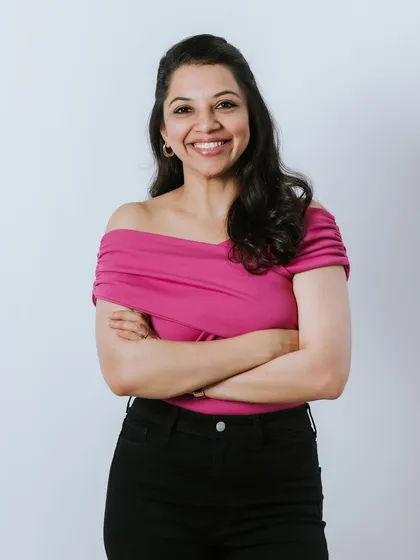 For my own branding, I wanted a portrait that felt warm and approachable. A clean studio background and a genuine smile help create a connection, which is exactly what I aim to do for my clients in their own branding sessions.