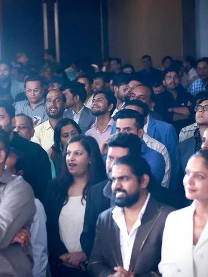 The audience at our collaboration event, filled with enthusiastic investors and dealers. These events are where we build strong relationships and present exclusive opportunities.