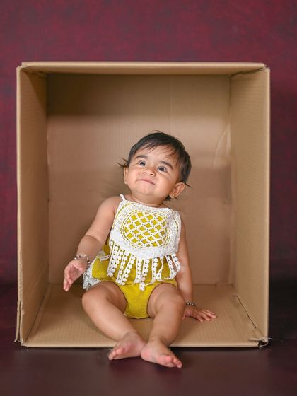 A thoughtful expression from the 'baby in a box' series.