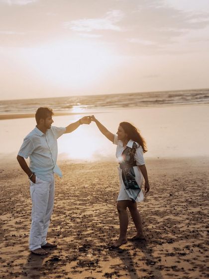 A simple dance on the sand as the sun sets. These unposed, in-between moments often make for the most memorable couple portraits.