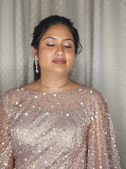 A close-up of the final look. The skin is glowing and the eyes are beautifully defined.