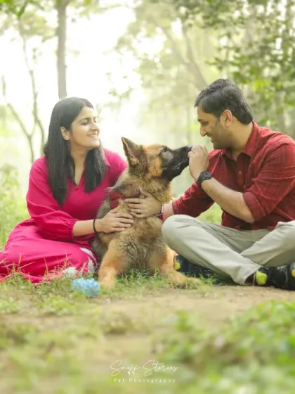 A family is not complete without the pitter-patter of paws. We captured this beautiful moment of connection with a German Shepherd and his loving family in a serene park setting. Our family sessions are designed to be relaxed and fun, allowing these natural interactions to shine.