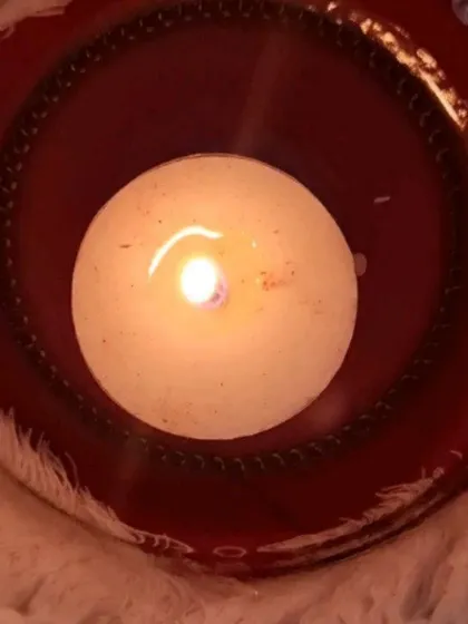 A close-up of a lit diya, perfect for creating a festive Diwali atmosphere.