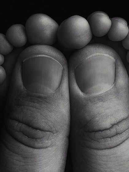 Ten tiny toes. I love capturing the little details that you'll want to remember forever. This macro shot of a newborn's feet is a beautiful and artistic keepsake.