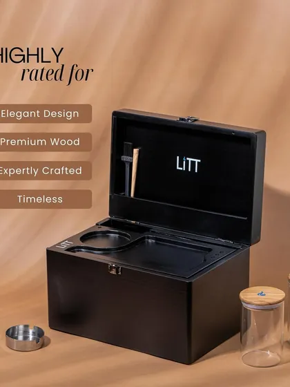 An elegant shot of the LIIT stash box, highlighting its premium wood and expert craftsmanship. The soft, warm lighting and clean background give it a luxurious feel.