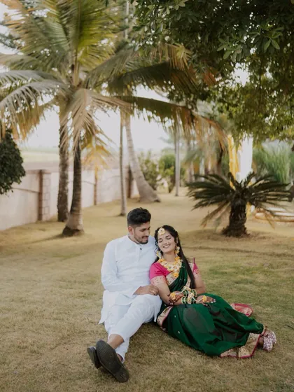 A quiet moment amidst the fun of the Haldi ceremony. I take time to capture relaxed couple portraits, showcasing their connection even during the most energetic events.