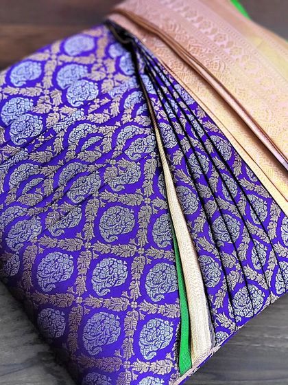 The final folded purple bridal saree.