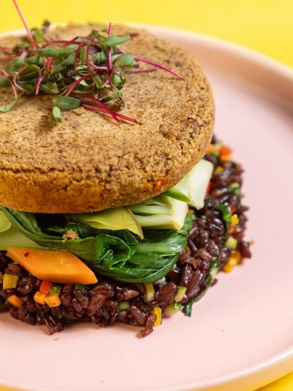 Another look at our innovative Black Rice Burger. We use nutrient-dense ingredients to create meals that are not only good for you but also visually appealing and incredibly satisfying.