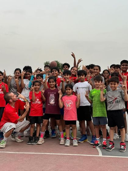 Another group shot with Coach Toni. The smiles and energy show what a positive impact these special sessions have on our community.