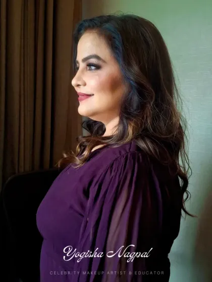 A beautiful soft glam look for a client in a wine-colored dress. The sparkling eyes and perfectly matched lip color create a harmonious and elegant appearance.