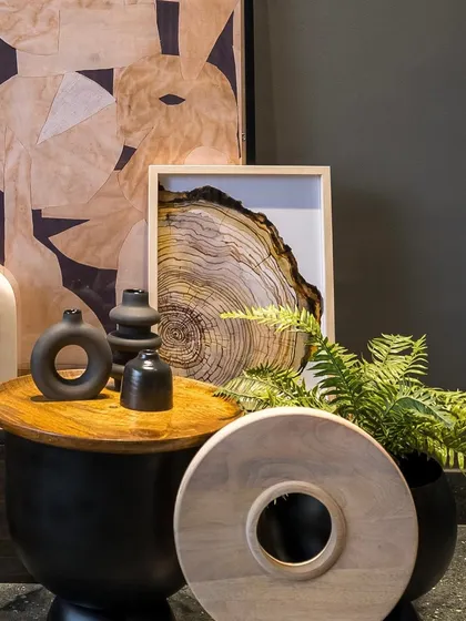 This carefully styled corner adds a layer of warmth and personality to the showroom, making it feel less like a store and more like a curated home.