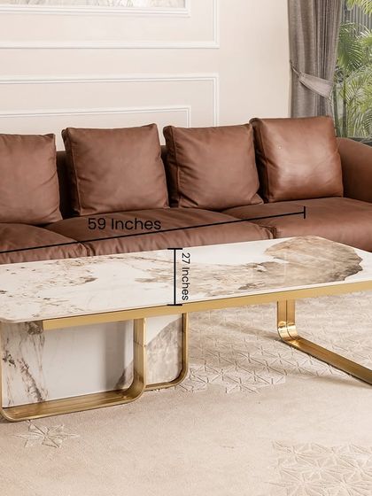 This image shows the generous dimensions of our luxurious rectangular coffee table. At 59 inches long, it's perfectly scaled for larger seating areas, providing ample space for decor, drinks, and more.