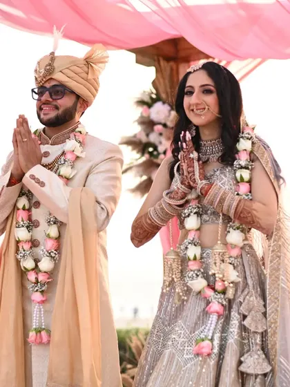 A beautiful moment from the phera ceremony. For this modern bride, I crafted a dewy, fresh makeup look with soft contouring and a natural lip color that enhanced her features beautifully under the open sky.