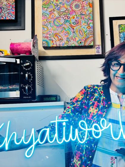 The glow of the neon sign adds a magical touch to my studio, especially in the evenings.