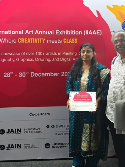 With a visitor at my last art exhibition of the year. It's always a pleasure to discuss my work and hear different interpretations.